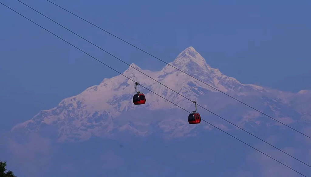 Mount Manaslu in the backdrop is captured while riding Chandragiri cable car in Kathmandu.