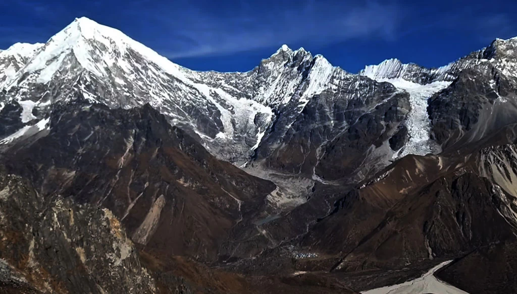 A view of Langtang Lirung, Langtang II, Glaciers and teeny tiny appeared Kyanjin Gompa pictured before the last push to Ganja La Pass.