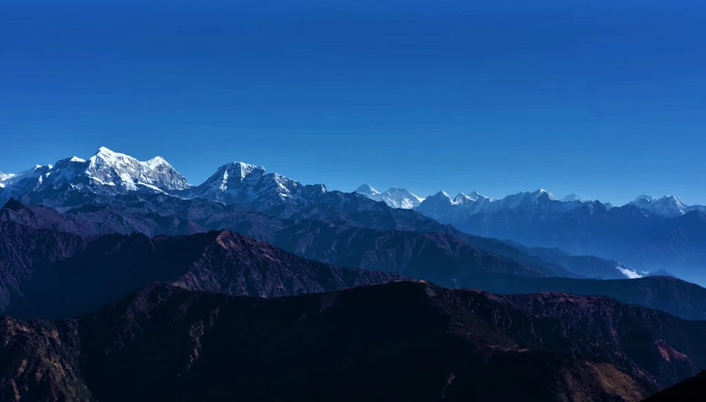 An amazing view of snowcapped mountains including Number Himal, Mount Everest and other mountains is pictured from the top of Pikey Peak.