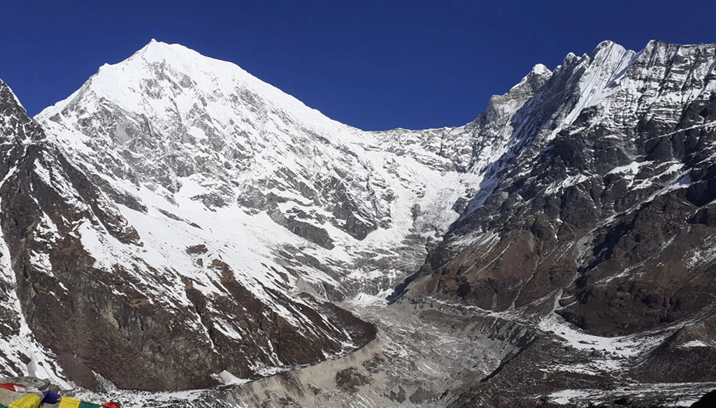 a stunning view of langtang lirung and langtang yabru is pictured from kyangjin gompa during the langtang valley trek