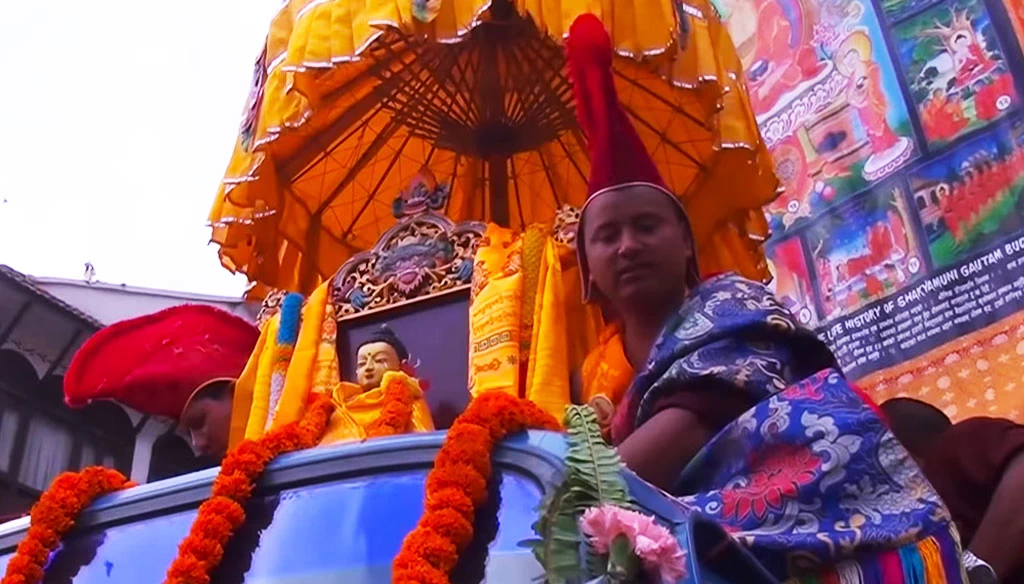 monks are mounting buddha statue during the buddha jayanti festival in boudhanath kathmandu