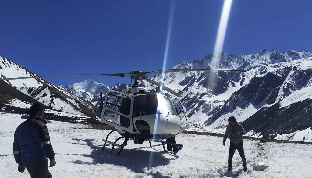 Helicopter landing at Kyanjin Gompa during the Langtang Gosainkunda helicopter Tour.