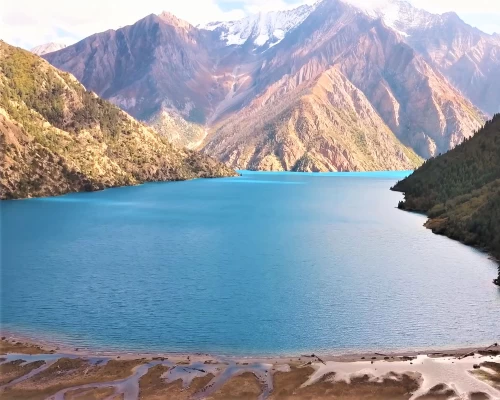 Phoksundo Lake And Kanjirowa Mountain Range In The Background.