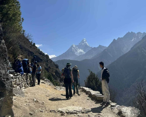 Porter, Trekkers And Amadablam